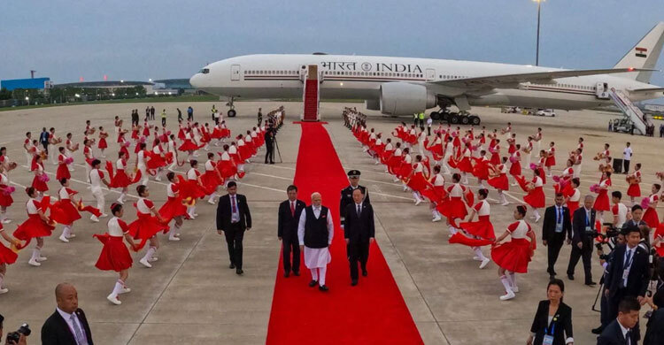 চীনে পৌঁছেছেন মোদী, সাত বছরে প্রথম সফর
