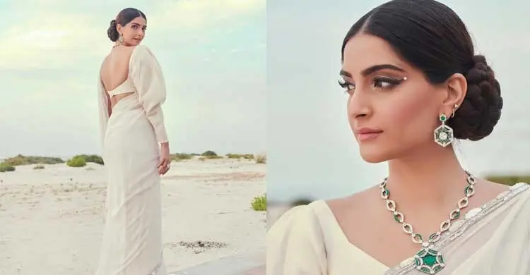 ব্যাকলেস ব্লাউজ ও সাদাশাড়িতে মুগ্ধতা ছড়াচ্ছেন সোনম
