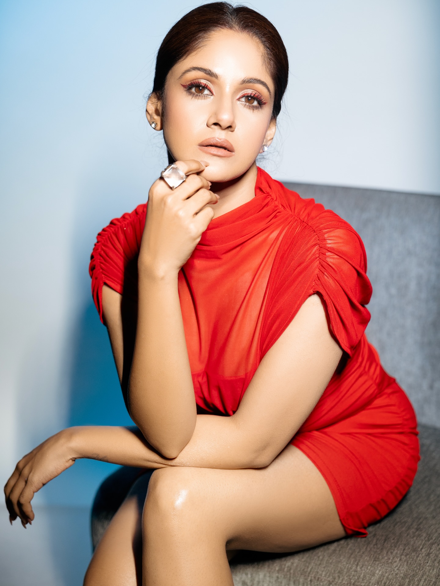 লাল মিনি ড্রেসে আত্মবিশ্বাসী তৃণা