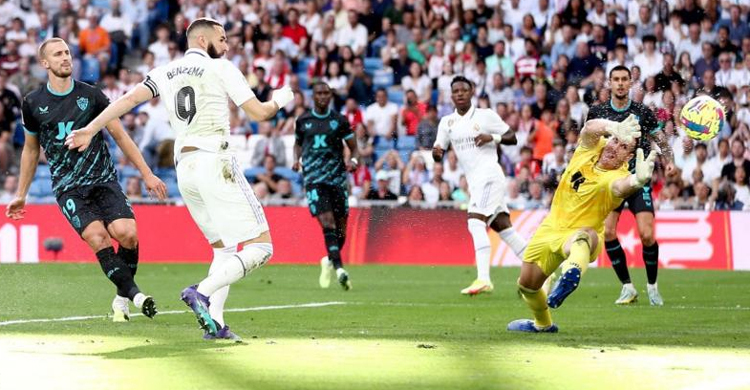 Benzema hat-trick helps Real see off Almeria
