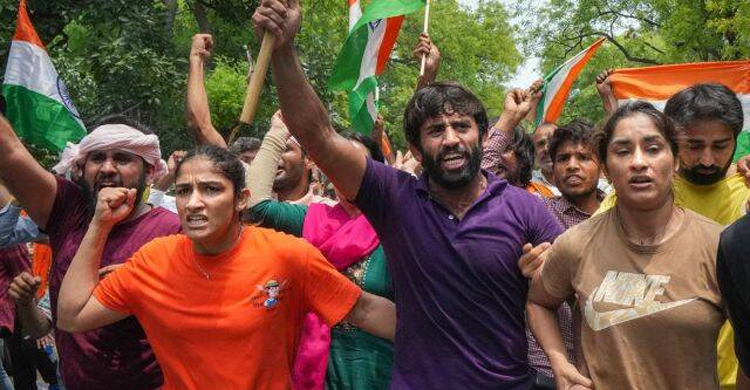 Protesting wrestlers say will 'immerse' medals in Ganga