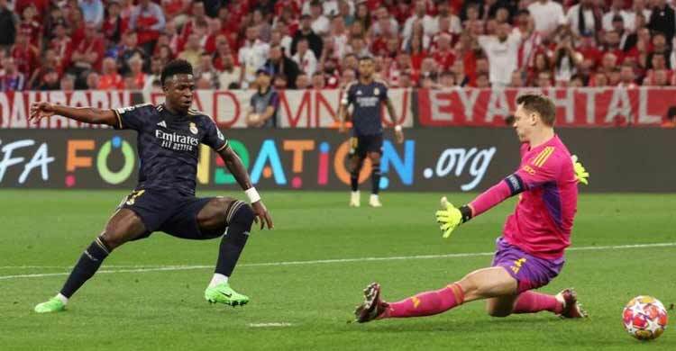 Vinicius' double earns Real draw with Bayern