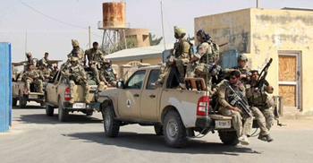 Battle continues for key Afghan city