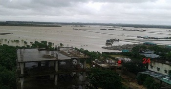 Cyclone Komen getting weak