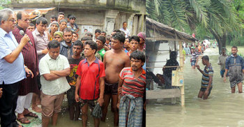 বেড়িবাঁধ ভাঙায় আশ্রয়ের খোঁজে বানভাসিরা