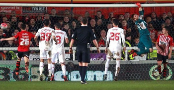 Liverpool escape with draw at Exeter