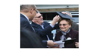 93 year old woman gets diploma