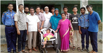বদলগাছীতে প্রতিবন্ধী শিশুকে হুইল চেয়ার প্রদান