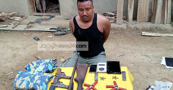 অস্ত্রসহ জেএসএস কর্মী আটক