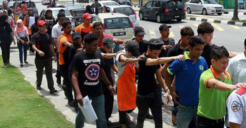 Malaysia to partially lift ban on hiring foreigners