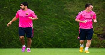 Messi humiliates Suarez in training