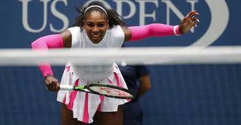 Serena reaches last 16 with record win