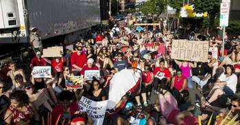 US police shootings: Protests spread with dozens of arrests