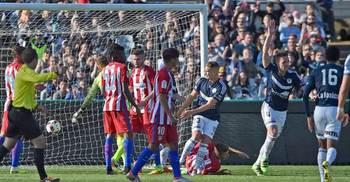 Atletico Madrid crash to defeat in Australia  