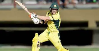 Australia grinds WI to bonus point win