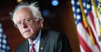 I am proud to stand with her: Bernie Sanders