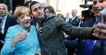 Refugee Anas Modamani suing Facebook over Angela Merkel selfie