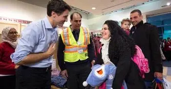 Canada’s Trudeau welcomes refugees
