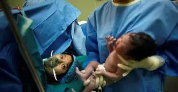 China considers paying couples to have a second child  