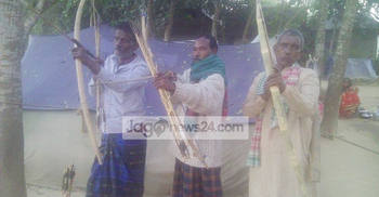 জানমাল রক্ষায় সাঁওতালদের সম্বল শুধু তীর-ধনুক