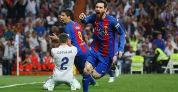 Messi`s 500th Barca goal sinks Real Madrid in thriller