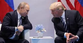 Trump and Putin debate US election hack at first meeting 
