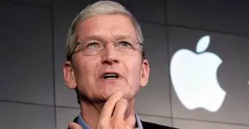 Apple CEO Tim Cook`s pay slumps along with iPhone sales 