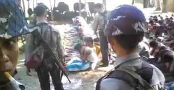 Myanmar detains police over Rohingya abuse video