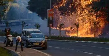 Thousands flee bushfires as Israel alleges ‘arson terror’ 