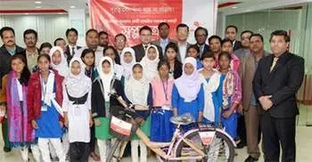 Midland Bank Limited distributes bicycles among school girls  