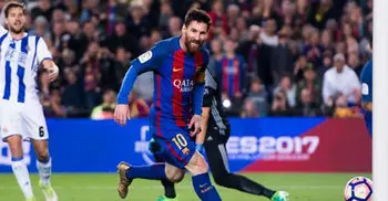 Messi helps Barca to beat Real Sociedad