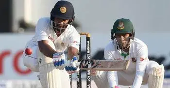 Karunaratne, Mendis give Sri Lanka lead