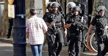 Police hunt van driver who killed 13 in Barcelona
