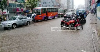In pictures: Rain cripples life in Dhaka