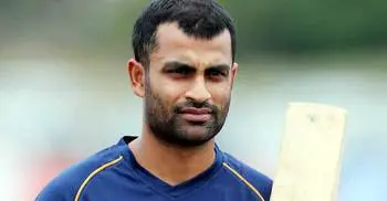 Tamim returns home from UK