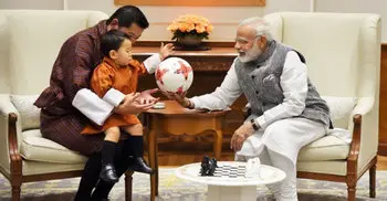Modi gifts a football to Bhutan Prince