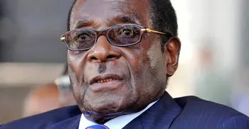 Zimbabwe ruling party says Mugabe should step down