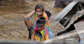 Philippines tropical storm: 130 dead after flooding