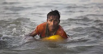 Rohingya boy can’t swim, floats on container to Bangladesh