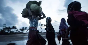Sri Lanka arrests 6 in hunt for monks who attacked refugees