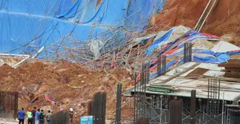 20 feared buried in Malaysia landslide