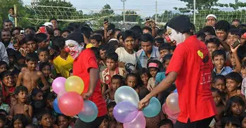 Clowns bring laughter to traumatised Rohingya children