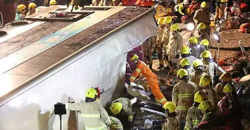19 dead, 65 hurt as Hong Kong bus overturns