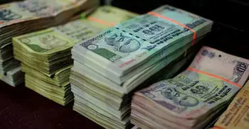 Indian boy distributes dad’s Rs 46L to his friends