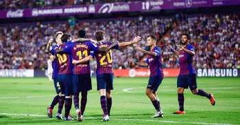 Barcelona, Atletico secure narrow wins