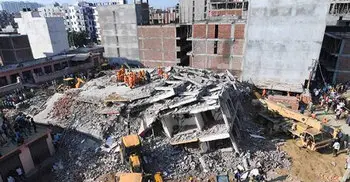 Building collapse in Delhi suburb kills 2, more feared dead