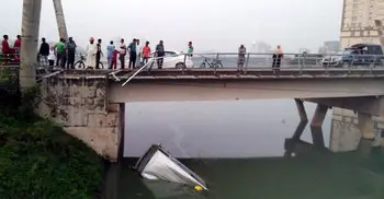 Microbus hits Hatirjheel bridge railing, falls into ditch