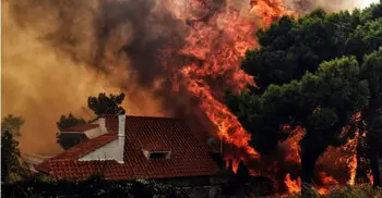 Greece wildfires leave at least 20 dead