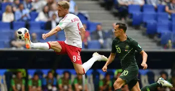 Australia hold Denmark