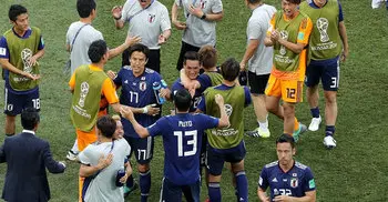 Japan sneak through to World Cup last 16 despite Poland defeat